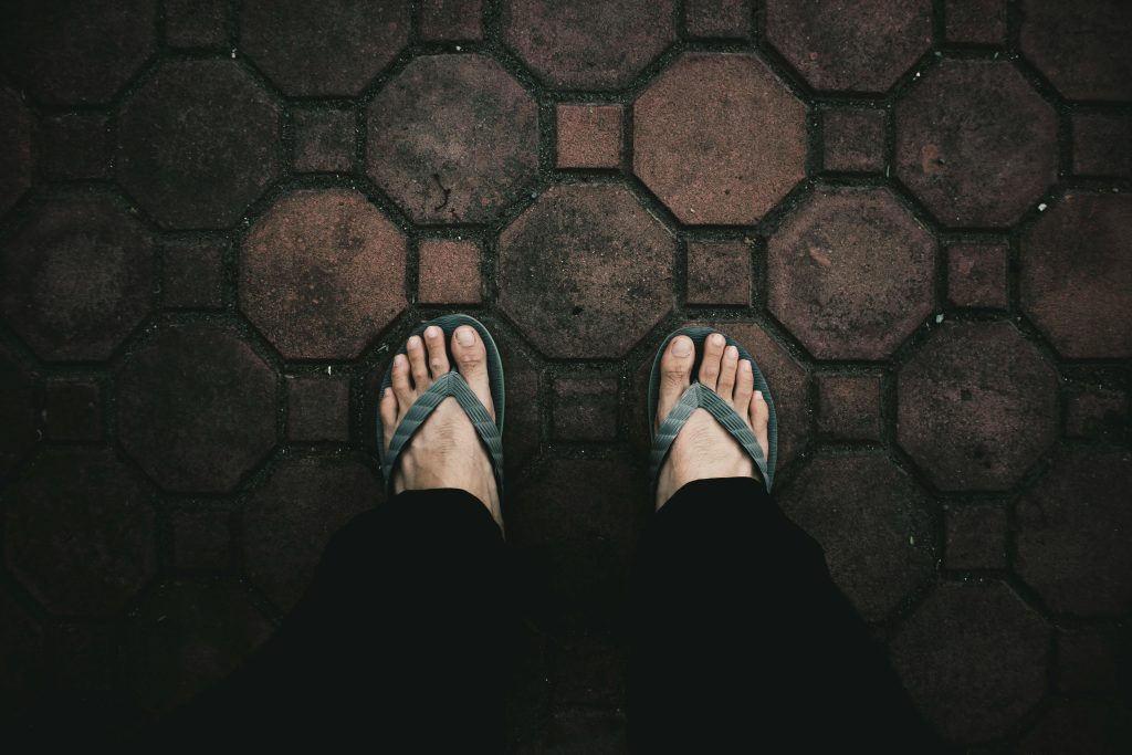 Person standing on pavers