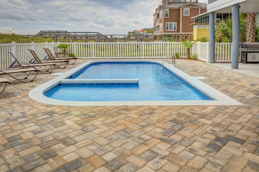 Paver patio with a pool