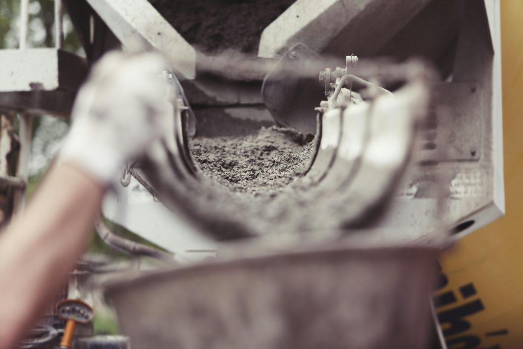 Person pouring concrete